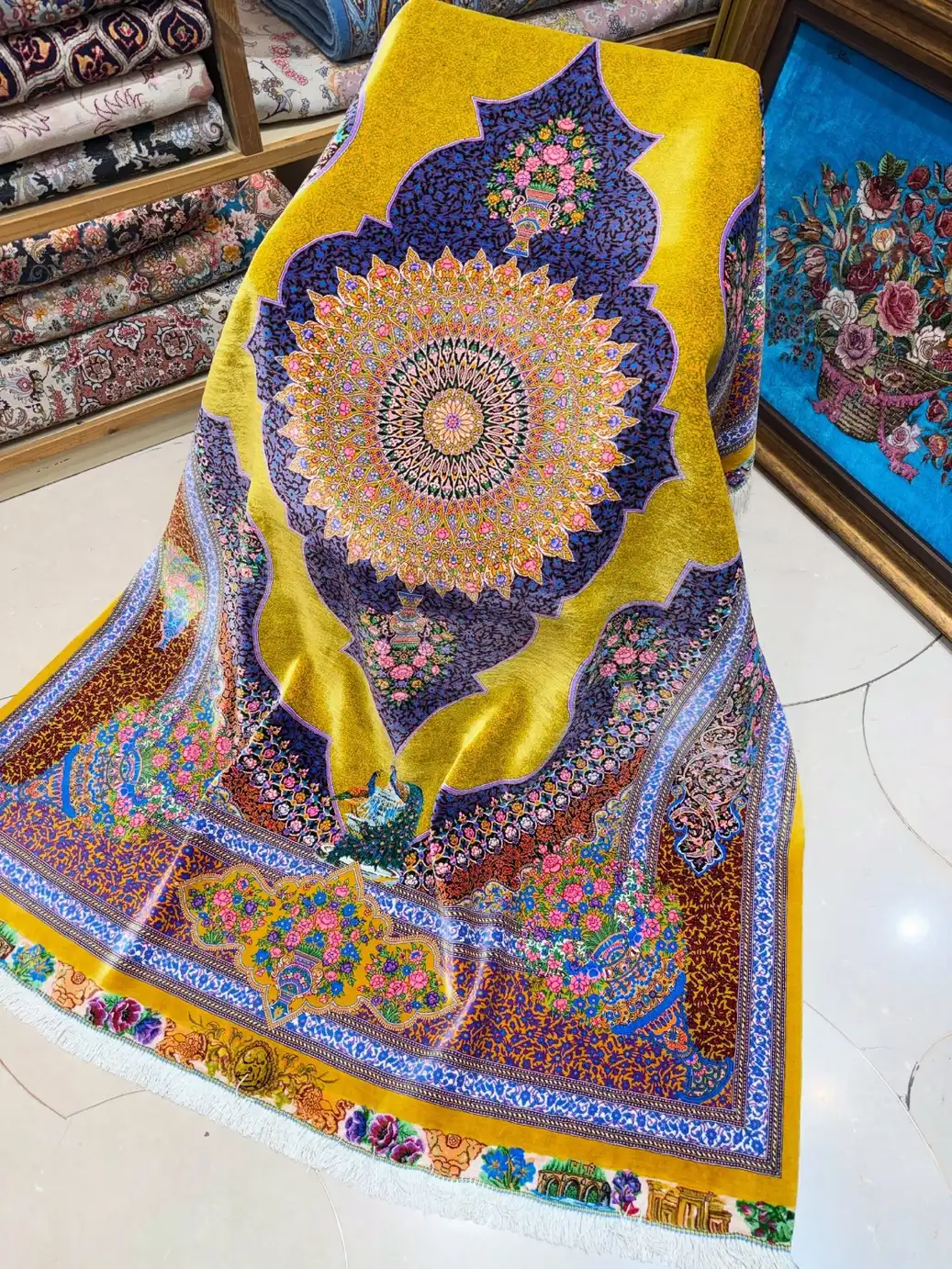Golden yellow Qom pure silk carpet PRR-HM-002 draped over a chair with navy central medallion