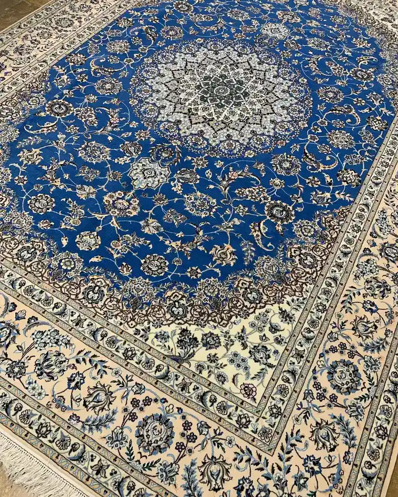 Isfahan Persian Handmade Carpet — Royal Blue Ivory Grand Floral Medallion — 257 × 356 cm — angle view